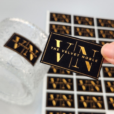 خرید High Quality Customized Embossed UV Gold Foil Printing Card Press Gold Art Paper Velvet Gold Stamping Label Sticker for Perfume & Party  online manufacture